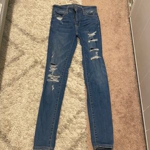 Size 00 American Eagle skinny ripped jeans. Very lightly worn. No damage/stains